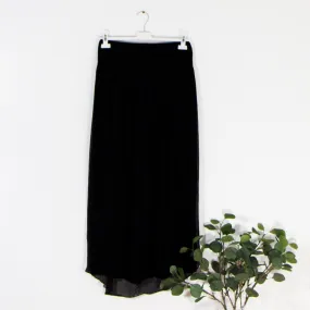 Free flowing silk trousers with comfortable under layer and trouser cape
